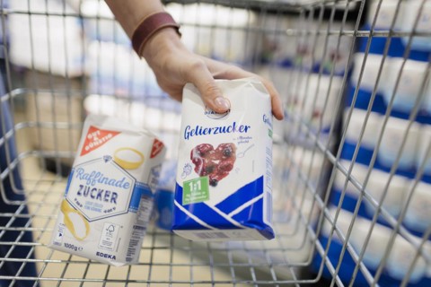 Sugar and gelling sugar in a shopping trolley. Radevormwald, Germany, Europe