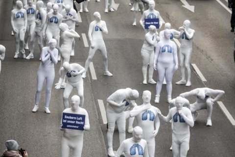 Protest of the environmental organisation Greenpeace, on the Bundesstrasse 14 40 activists demand better air quality, the Neckartor is considered the most polluted street in Germany with high levels o...