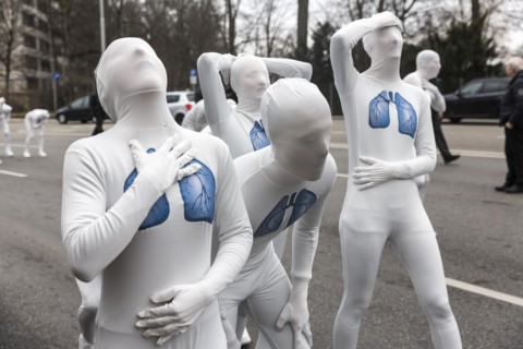Protest of the environmental organisation Greenpeace, on the Bundesstrasse 14 40 activists demand better air quality, the Neckartor is considered the most polluted street in Germany with high levels o...