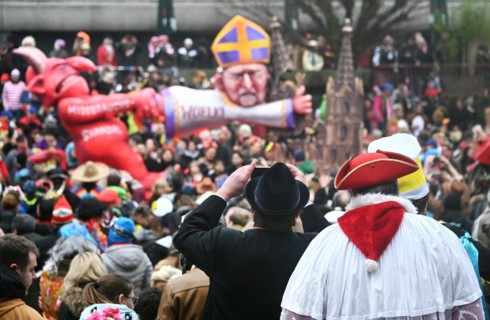 Theme floats by Jaques Tilly: Abuse scandal in the Catholic Church surrounding Cardinal Rainer Maria Woelki, Rosenmontagszug in Duesseldorf, North Rhine-Westphalia