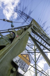 High voltage danger to life, warning sign on an overhead line electricity pylon, Duisburg, North Rhine-Westphalia, Germany, Europe