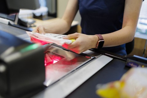 Cashier in a supermarket. Radevormwald, Germany, Europe