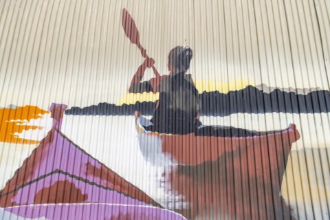Graffito of a female paddler, Brandenburg an der Havel, Brandenburg, Germany, Europe