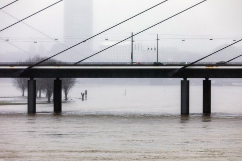 High water on the Rhine in Duesseldorf, view of the Rheinkniebruecke, Duesseldorf, North Rhine-Westphalia, Germany, Europe