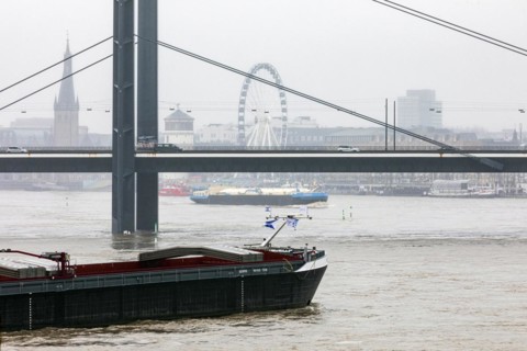 Flooding on the Rhine in Duesseldorf - View of Rheinkniebruecke, Old Town with Lambertus Church, Castle Tower and Ferris Wheel, Duesseldorf, North Rhine-Westphalia, Germany, Europe