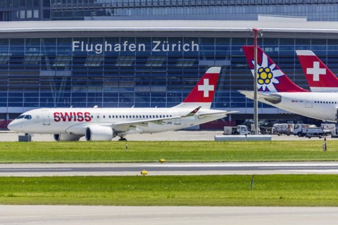 Airport ZRH with aeroplanes of the airline Swiss as well as Edelweiss, terminal with the inscription Airport, Zurich, Switzerland, Europe