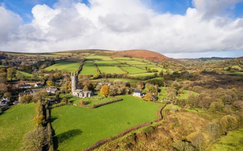 St Pancras Church in Widecombe in the Moor from a drone