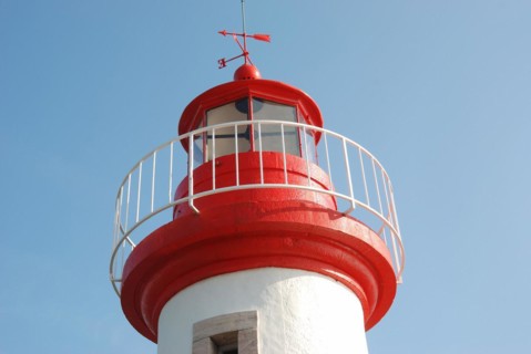 Lighthouse on a blue sky