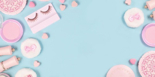 Banner with cute pink makeup beauty products like brushes