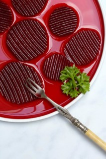 Sliced pickled beetroot on plate