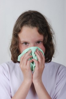 Girl sneezing