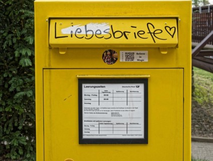 German Post Office letterbox with graffiti love letters