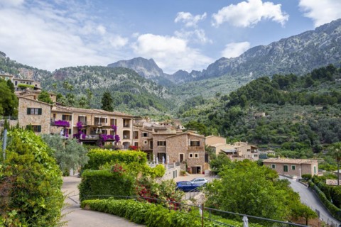 Typical houses of the mountain village Fornalutx with mountain landscape