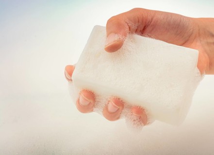 Hand washing and soap foam on a foamy background