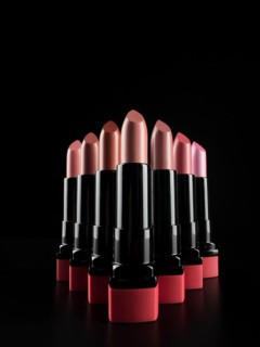 A set of lipsticks on a black background. makeup artist content