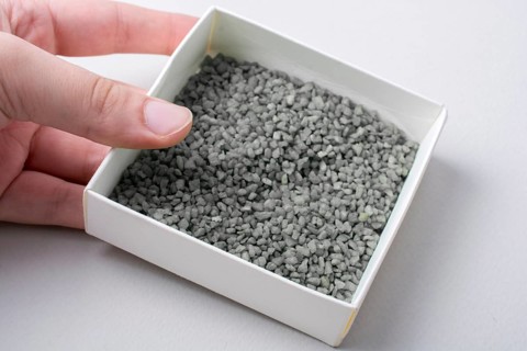 Little green color sand in box as a background texture