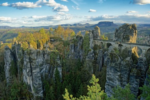 View from the Ferdinandstein to the Bastei Bridge and the rock castle Neurathen