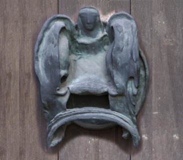 Left bronze fitting on the door of the Tugendbrunnenpotrtal