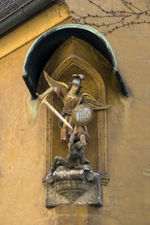 Sculpture of St. Michael the Archangel fighting the devil