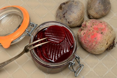 Pickled beetroot in glass jar and beetroot
