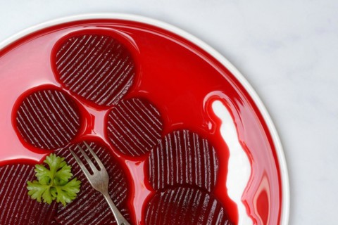 Sliced pickled beetroot on plate