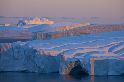 Icebergs at sunset in the Kangia icefjord