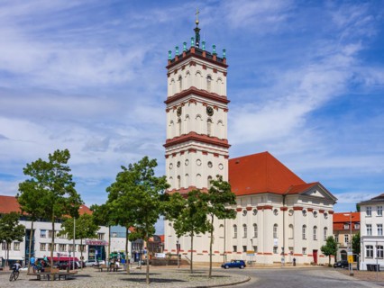 Lively scene in front of the town church on the historic market square of Neustrelitz