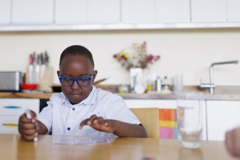 Boy with playing cards