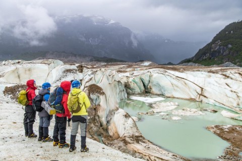 Hikers on the Exploradores glacier in the San Valentin massif