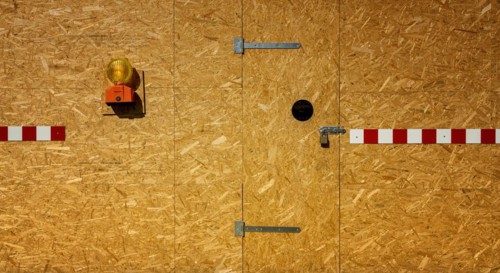 Building fence made of chipboard