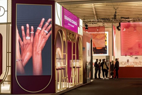 Video wall with precious rings on womans hands