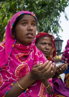 Indian Muslim women perform the second Friday prayer in the holy month of Ramadan near a Mosque in Guwahati