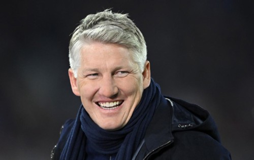 TV pundit Bastian Schweinsteiger laughs