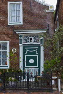 Front door on an old house on the edge of the harbour in Greetsiel