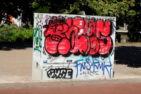 Graffitied colourful electricity distribution board