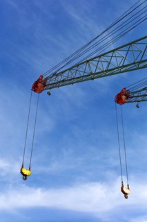 Two crane jibs with crane hooks