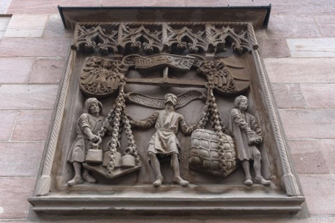 The relief of the scales by Adam Kraft