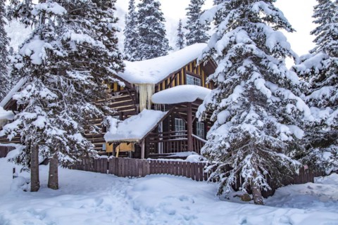 Snowy cabin in winter landscape at Chateau Lake Louise Hotel