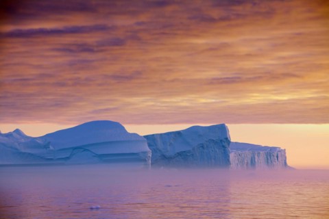 Icebergs at sunset in the Kangia icefjord