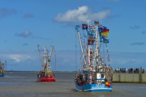 Decorated crab cutter leaving the harbour of Neuharlingersiel