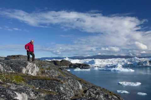 Tourist looking at Kangia Icefjord