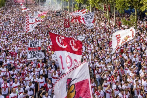 Fans of VfB Stuttgart on their way to the stadium