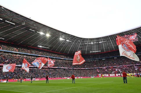 Flag wavers in front of the start of the match