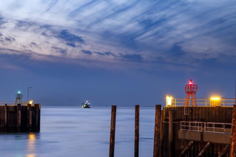 Harbour entrance in Cuxhaven at the mouth of the Elbe at night