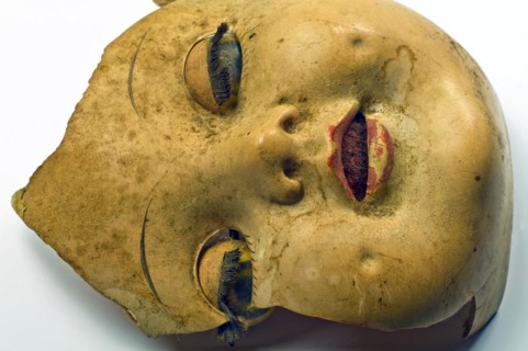 Broken doll head