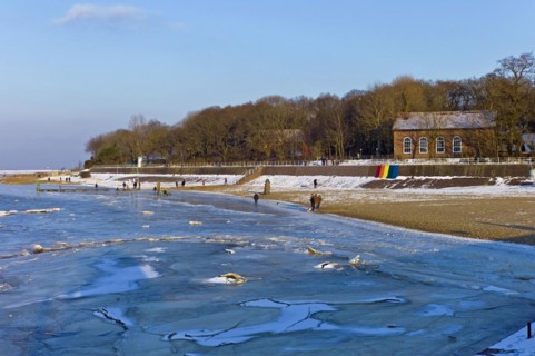 View over the frozen Jade Bay to the spa hotel in Dangast