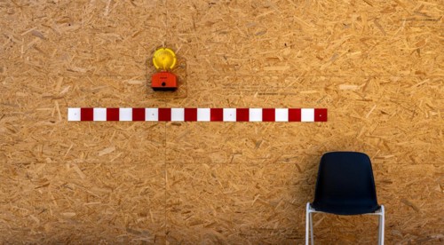 Building fence made of chipboard