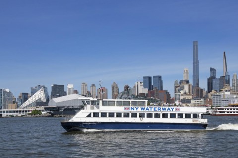 Ferry across the Hudson River in front of the USS Intreprid Sea-Air-Space Museum