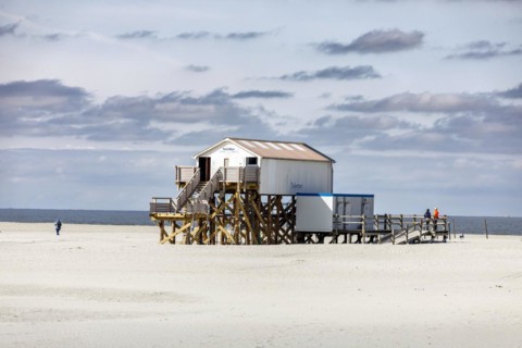 Sankt Peter-Ording beach with the typical pile dwellings