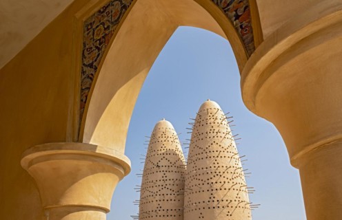 View of Pigeon Towers through the arcade arch of mosque